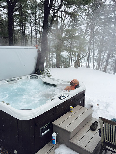 Hot Tub in Snowy Backyard