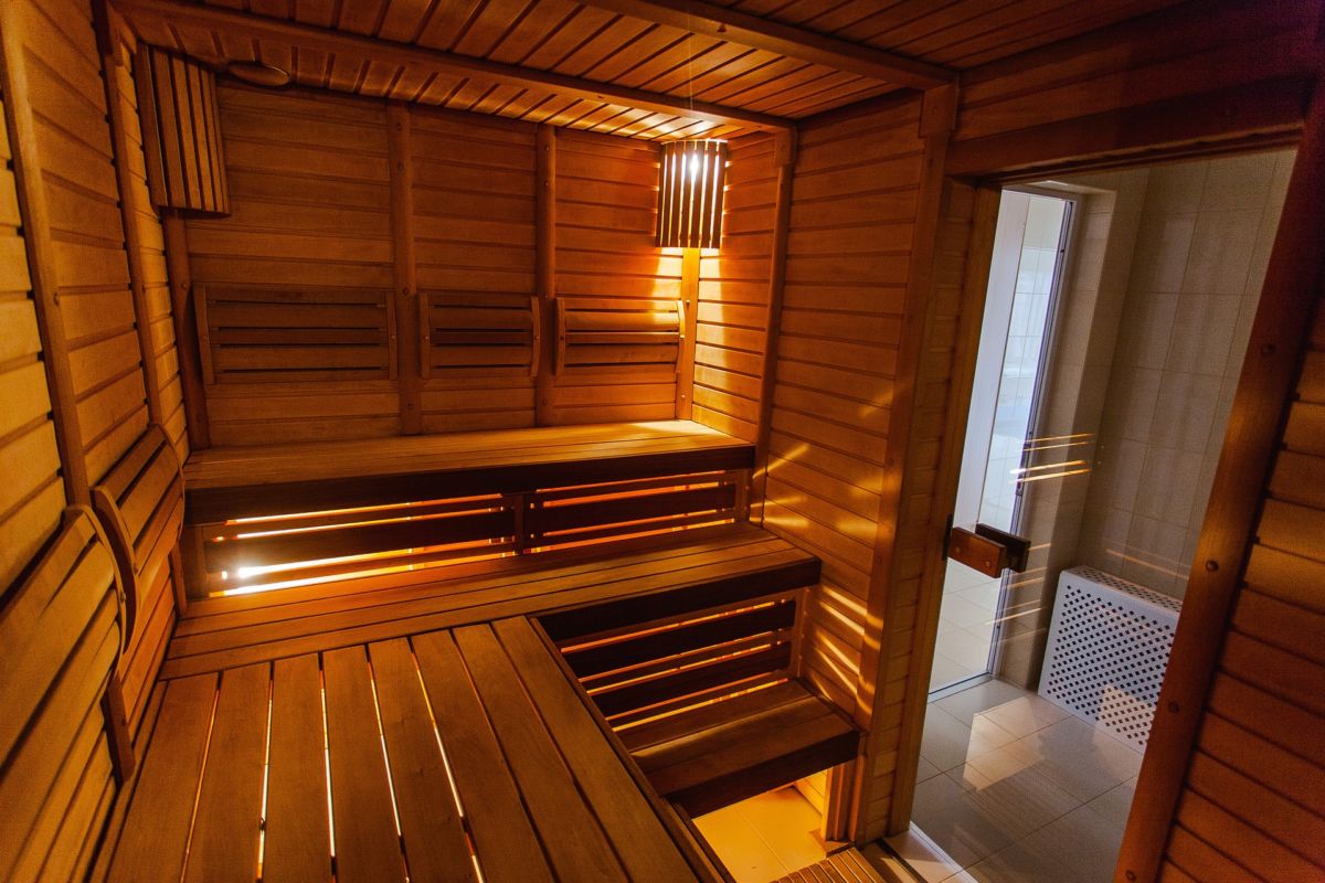 The Pros and Cons of Electric vs. Wood Burning Outdoor Saunas