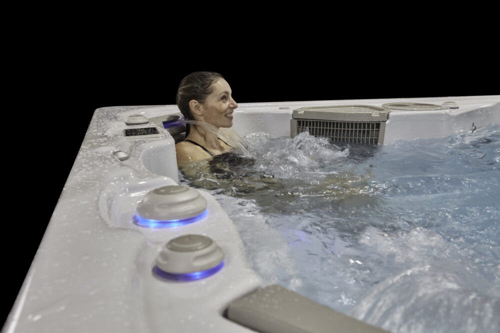 A person experiencing a hot tub.