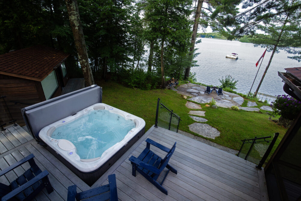 A hot tub by a lake.
